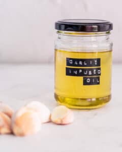 garlic infused oil in a glass jar