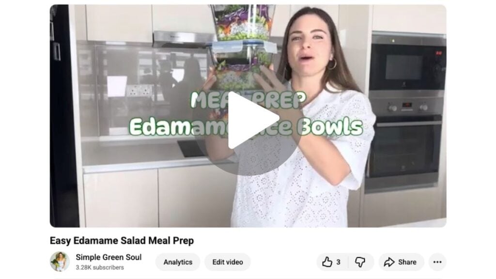 Cooking tutorial video showing how to assemble a healthy edamame salad rice bowl with fresh vegetables.