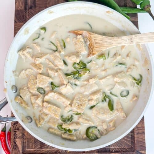 One-pot green curry tempeh in a creamy coconut milk broth with green chillies and fresh herbs.