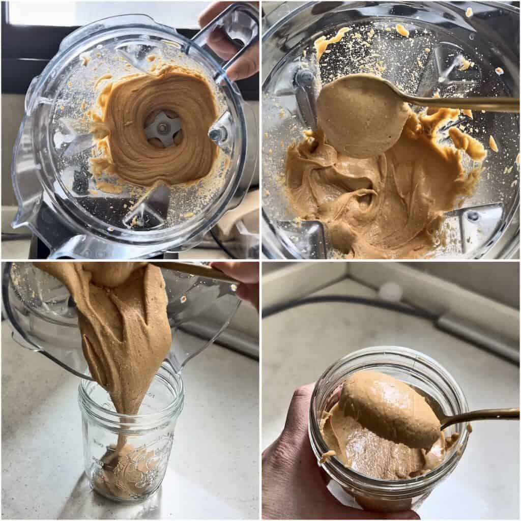 Smooth Vitamix peanut butter being spooned from the blender, transferred into a glass jar and shown with a creamy texture.